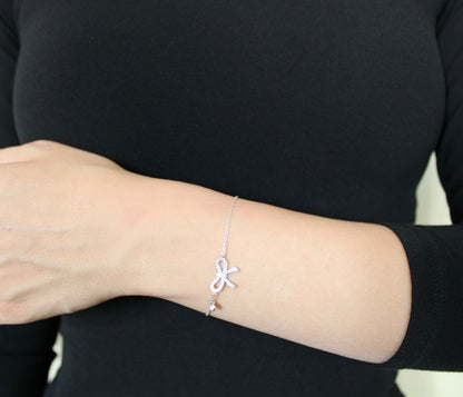 18k-white-gold-bow-bracelet.jpg