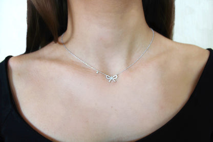 18k-white-gold-bow-necklace.jpg